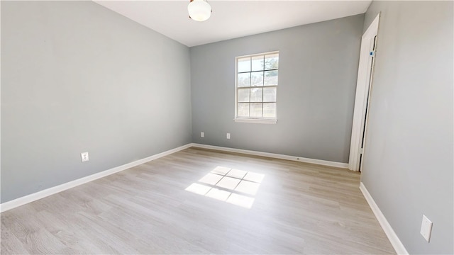 1301 Riverside Ave, Waycross, GA 31501 - empty room featuring light wood-style floors and baseboards