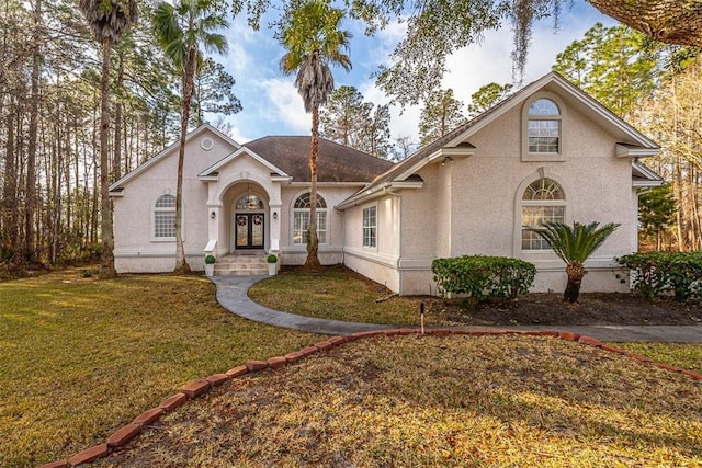 view of front of house with a front lawn