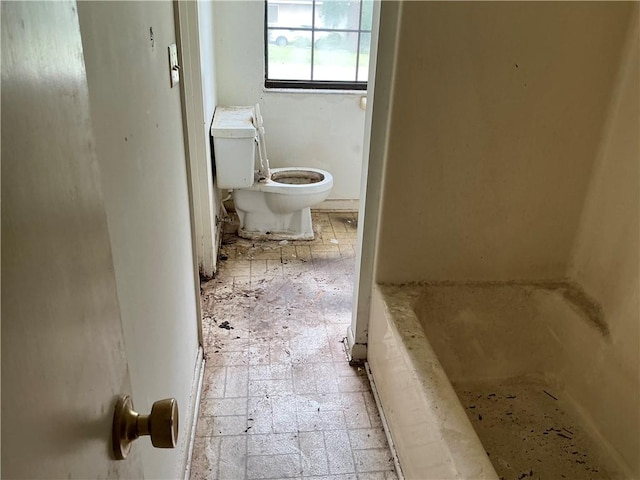 2608 Winchester Dr, Waycross, GA 31501 - bathroom with toilet and a bath