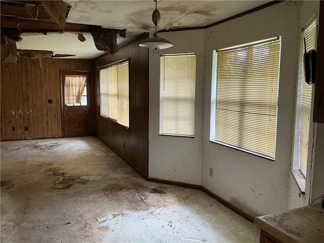 2608 Winchester Dr, Waycross, GA 31501 - spare room featuring plenty of natural light and wooden walls