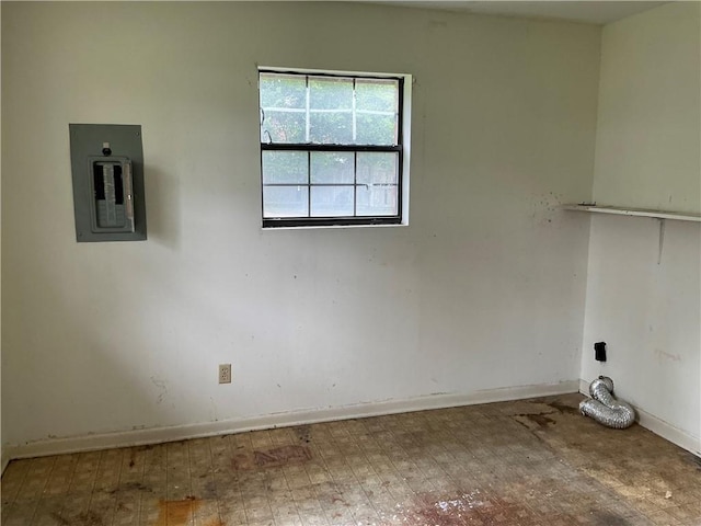 2608 Winchester Dr, Waycross, GA 31501 - laundry room featuring electric panel and baseboards
