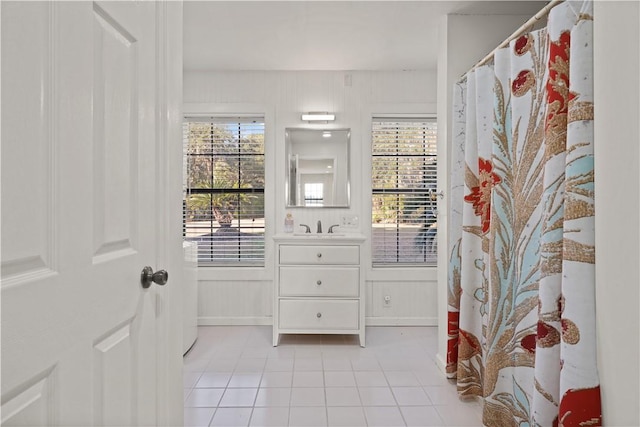 interior space featuring light tile patterned floors and sink