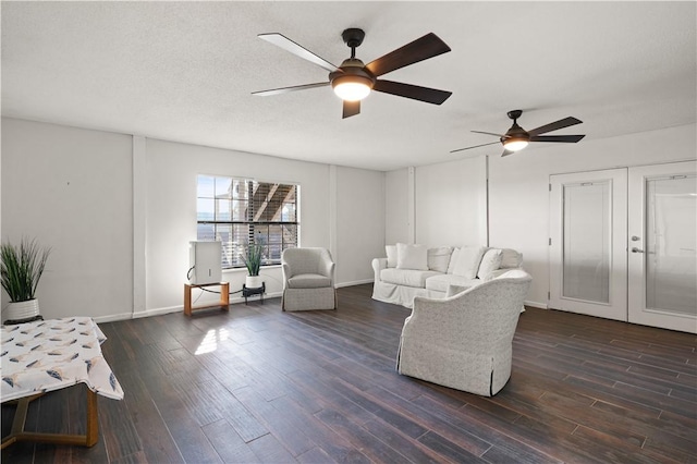 living room featuring dark hardwood / wood-style flooring, ceiling fan, and french doors