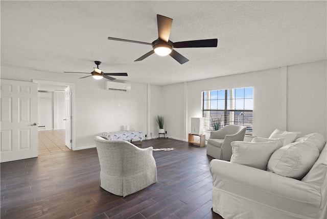 living room with ceiling fan, dark hardwood / wood-style floors, an AC wall unit, and a textured ceiling