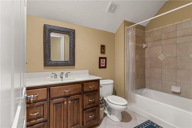 full bath featuring a textured ceiling, lofted ceiling, tile patterned flooring, toilet, and visible vents