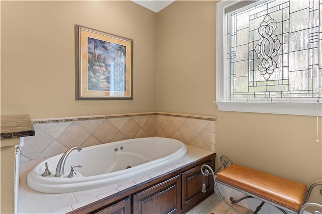 full bathroom featuring a tub with jets