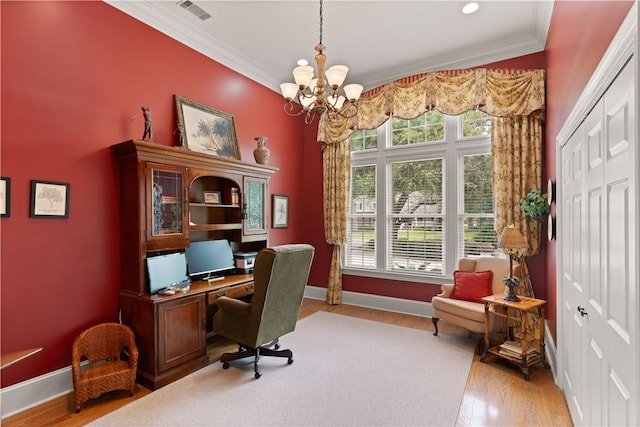 office area featuring visible vents, a chandelier, wood finished floors, and ornamental molding