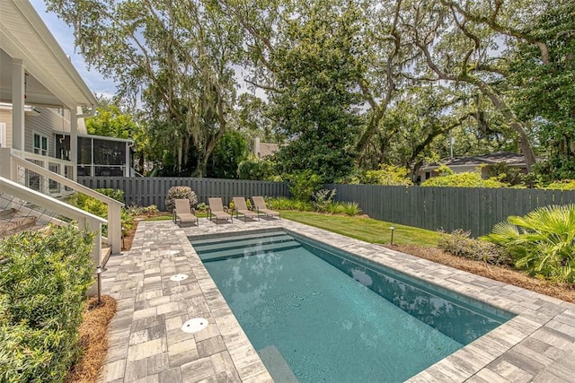 view of swimming pool featuring a patio