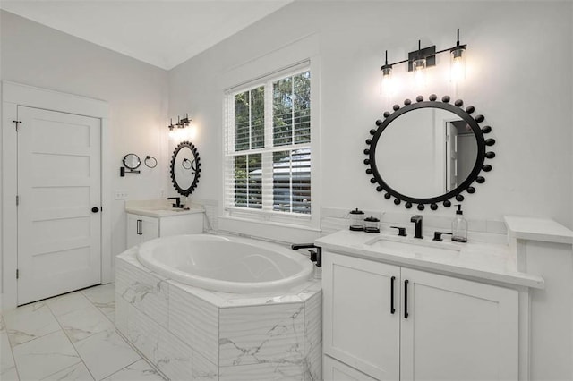 bathroom featuring vanity and tiled bath