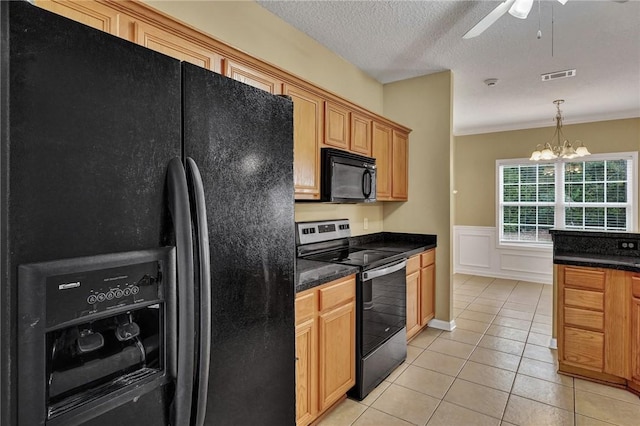 kitchen with visible vents, dark countertops, a textured ceiling, black appliances, and light tile patterned flooring