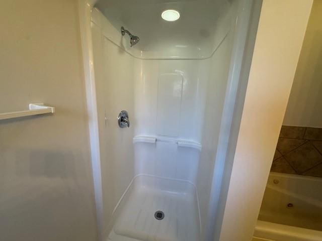 bathroom with walk in shower