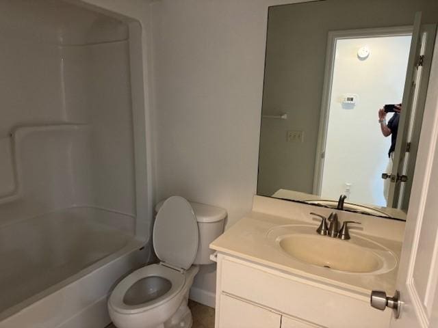 full bathroom with shower / tub combination, vanity, and toilet