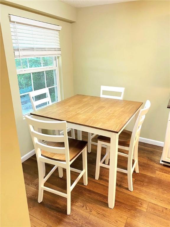 903 Atlantic Ave, Waycross, GA 31501 - dining room with wood finished floors and baseboards