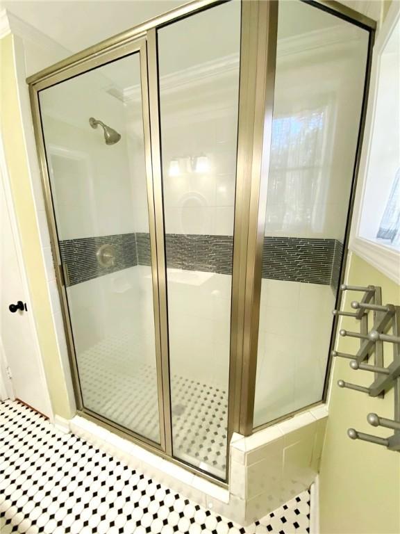 903 Atlantic Ave, Waycross, GA 31501 - bathroom with a stall shower and tile patterned flooring