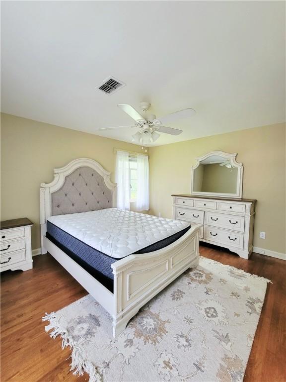 903 Atlantic Ave, Waycross, GA 31501 - bedroom featuring wood finished floors and ceiling fan