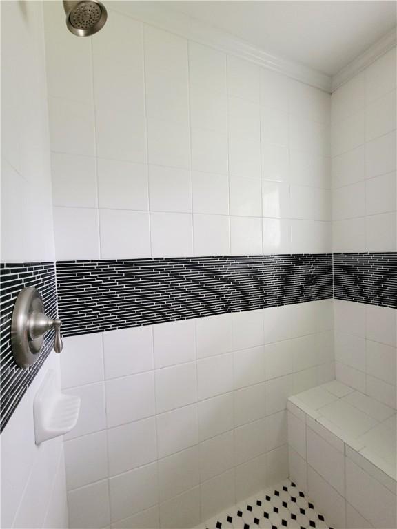 903 Atlantic Ave, Waycross, GA 31501 - full bath with ornamental molding and a tile shower