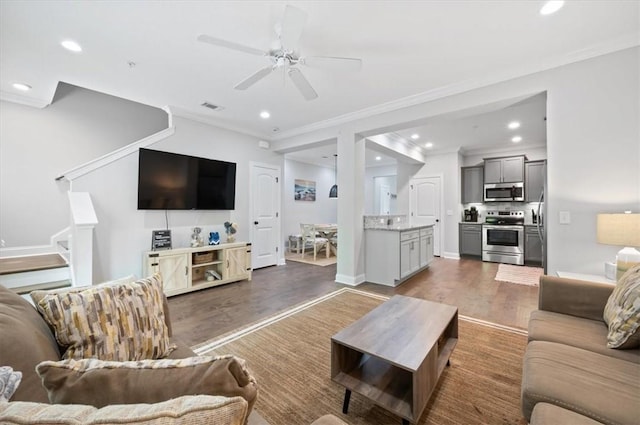 404 Mariners Cir, Saint Simons Island, GA 31522 - living area with wood finished floors, crown molding, a ceiling fan, recessed lighting, and baseboards
