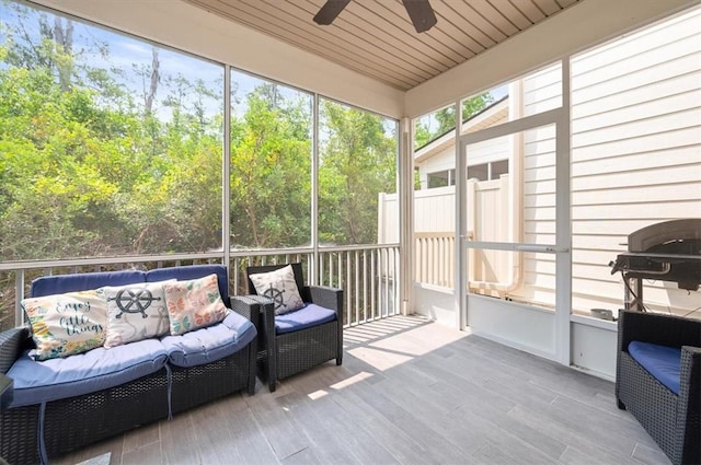 404 Mariners Cir, Saint Simons Island, GA 31522 - sunroom / solarium featuring a ceiling fan and an outdoor living space