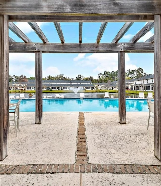 404 Mariners Cir, Saint Simons Island, GA 31522 - community pool featuring a patio area