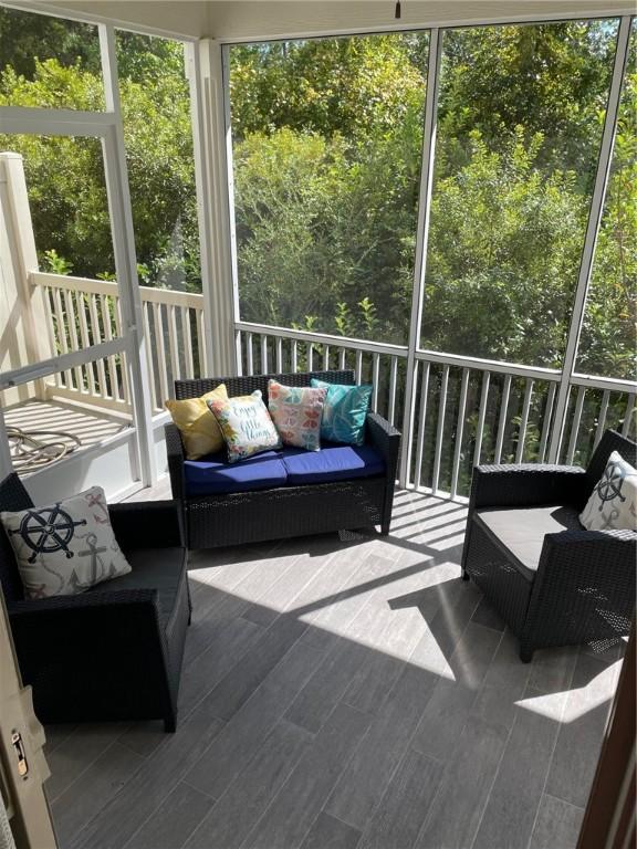 sunroom featuring plenty of natural light