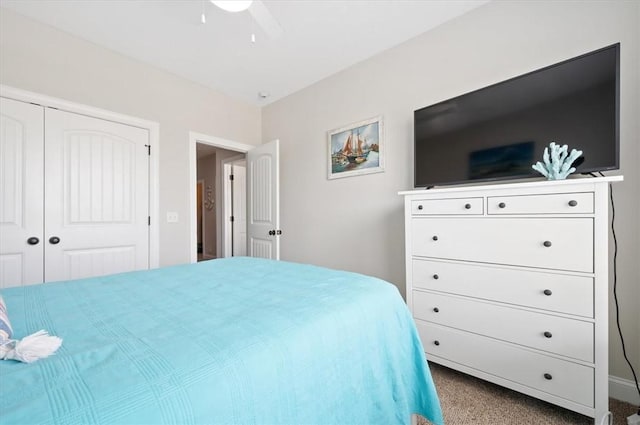 404 Mariners Cir, Saint Simons Island, GA 31522 - bedroom with carpet flooring, a closet, and a ceiling fan