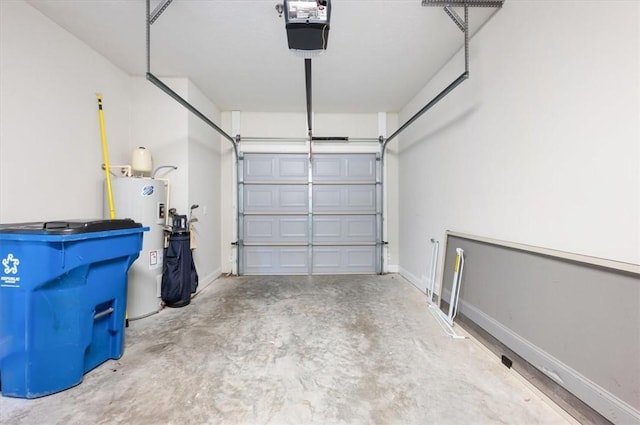 404 Mariners Cir, Saint Simons Island, GA 31522 - garage with a garage door opener, water heater, and baseboards