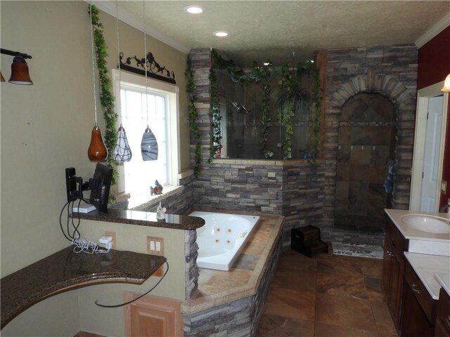 bathroom featuring plus walk in shower and vanity