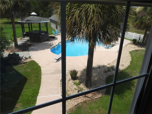 view of pool featuring a gazebo, a diving board, a yard, and a patio