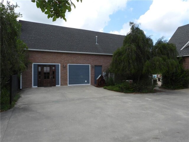 view of side of home with french doors