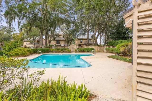 view of pool featuring a patio