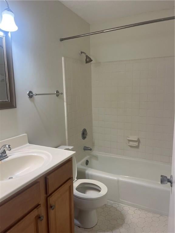 800 Mallery St Unit C-30, Saint Simons Island, GA 31522 - full bathroom featuring vanity, tub / shower combination, tile patterned floors, and toilet