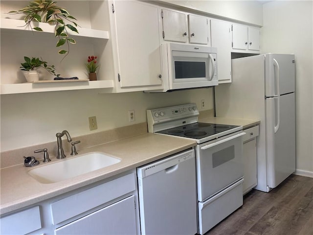 800 Mallery St Unit C-30, Saint Simons Island, GA 31522 - kitchen with white appliances, open shelves, a sink, dark wood-style flooring, and light countertops