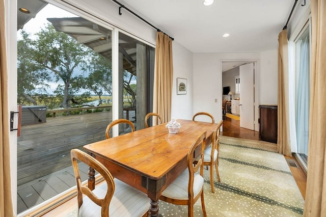 dining area featuring wood-type flooring