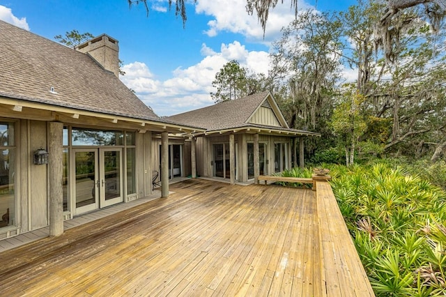 wooden deck featuring french doors