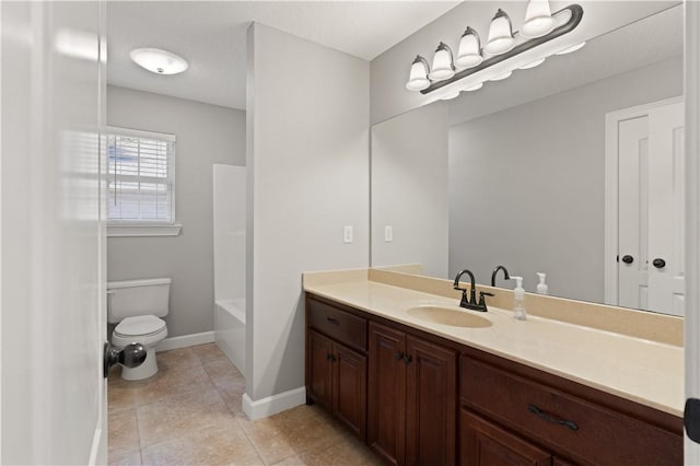 full bathroom featuring tile patterned floors, a textured ceiling, toilet, vanity, and bathtub / shower combination