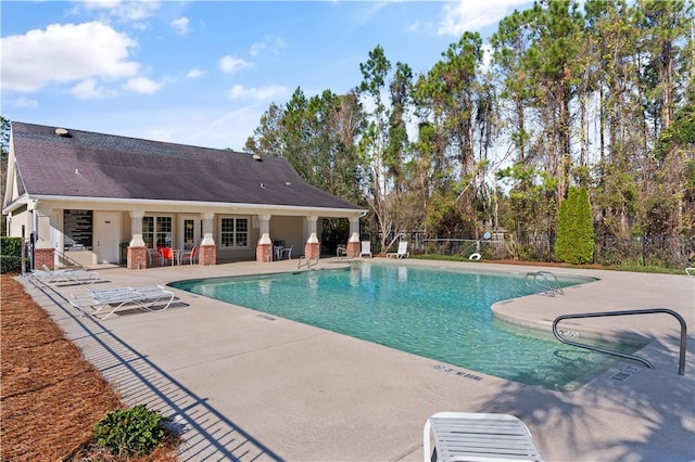 view of pool featuring a patio area