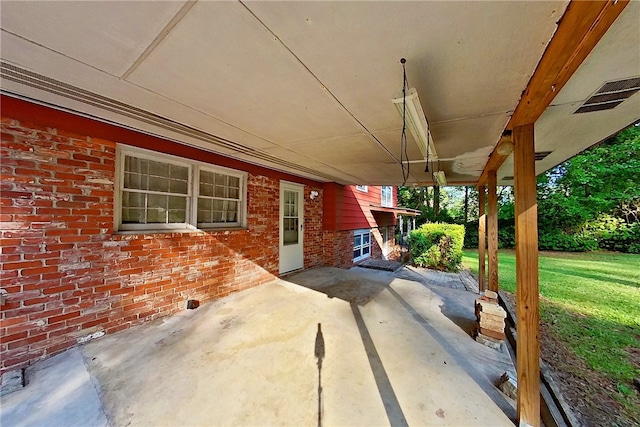 1206 Morningside Dr, Waycross, GA 31501 - view of patio / terrace with a carport