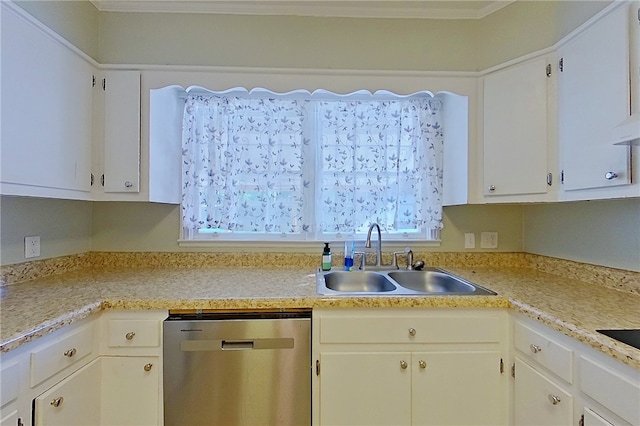 1206 Morningside Dr, Waycross, GA 31501 - kitchen with stainless steel dishwasher, light countertops, white cabinetry, and crown molding