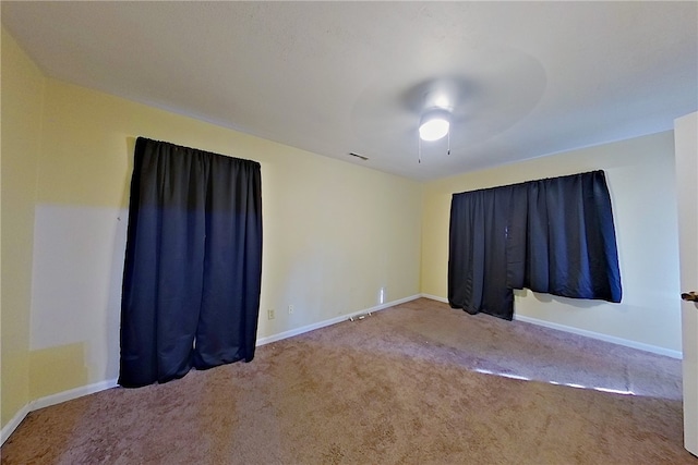 1206 Morningside Dr, Waycross, GA 31501 - carpeted spare room with ceiling fan and baseboards