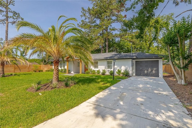 155 Mcdowell Ave, Brunswick, GA 31525 - ranch-style home with a garage and concrete driveway