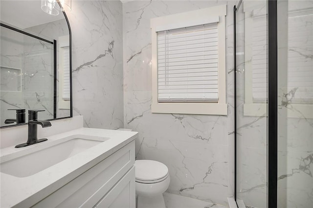 155 Mcdowell Ave, Brunswick, GA 31525 - full bathroom featuring vanity, toilet, a marble finish shower, and tile walls