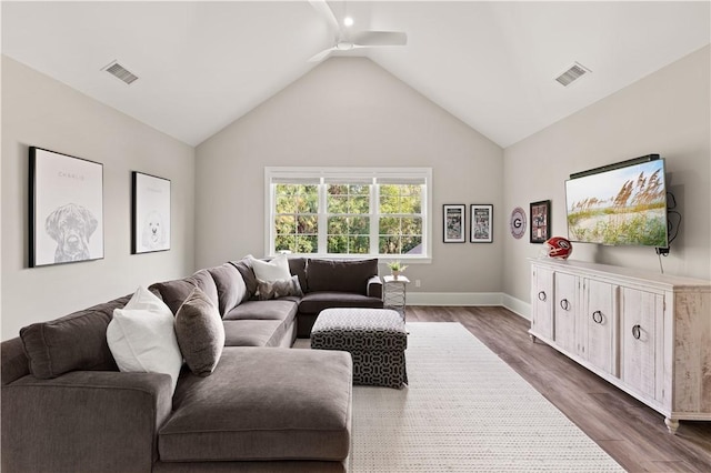 living room with baseboards, ceiling fan, visible vents, and dark wood finished floors