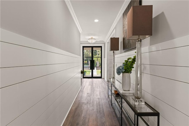 hall featuring a wainscoted wall, crown molding, wood finished floors, and recessed lighting