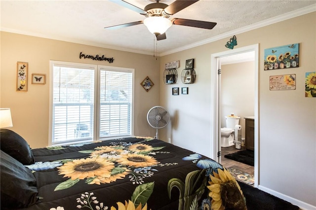 5618 Bowen Rd, Blackshear, GA 31516 - bedroom with crown molding, ensuite bath, and ceiling fan