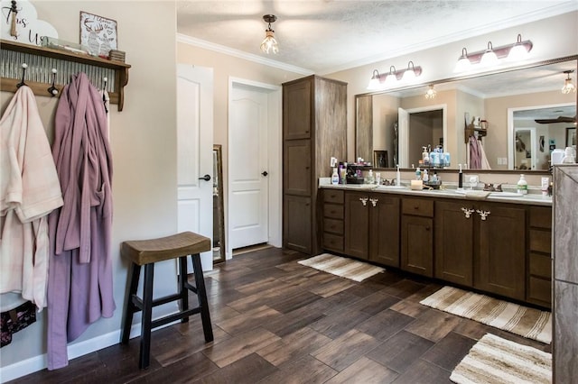 5618 Bowen Rd, Blackshear, GA 31516 - bathroom featuring double vanity, wood finished floors, and ornamental molding
