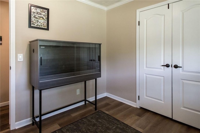 5618 Bowen Rd, Blackshear, GA 31516 - bedroom featuring ornamental molding and dark wood-style floors