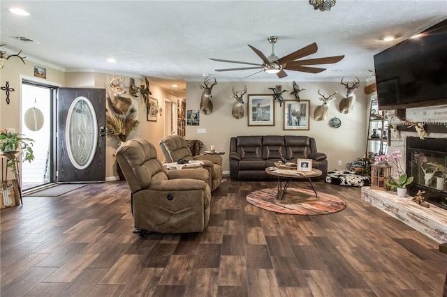 5618 Bowen Rd, Blackshear, GA 31516 - living area featuring ceiling fan, healthy amount of natural light, wood finished floors, crown molding, and recessed lighting