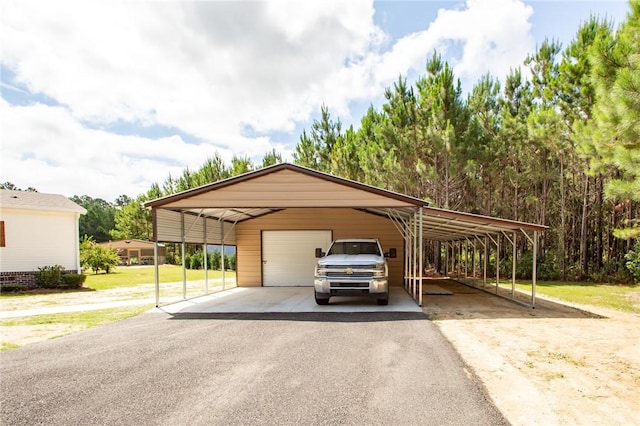5618 Bowen Rd, Blackshear, GA 31516 - view of parking featuring a detached garage