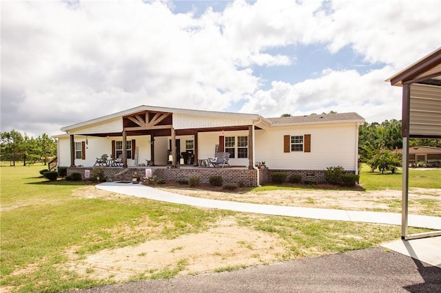 5618 Bowen Rd, Blackshear, GA 31516 - view of front of home with covered porch and a front lawn