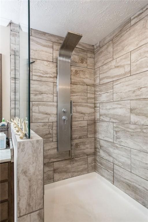 5618 Bowen Rd, Blackshear, GA 31516 - full bathroom with a walk in shower, a textured ceiling, and vanity